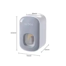 TOOTHPASTE DISPENSER WITH TOOTHBRUSH HOLDER